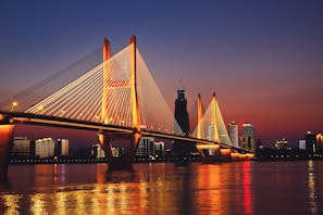 a large bridge spanning over a large body of water