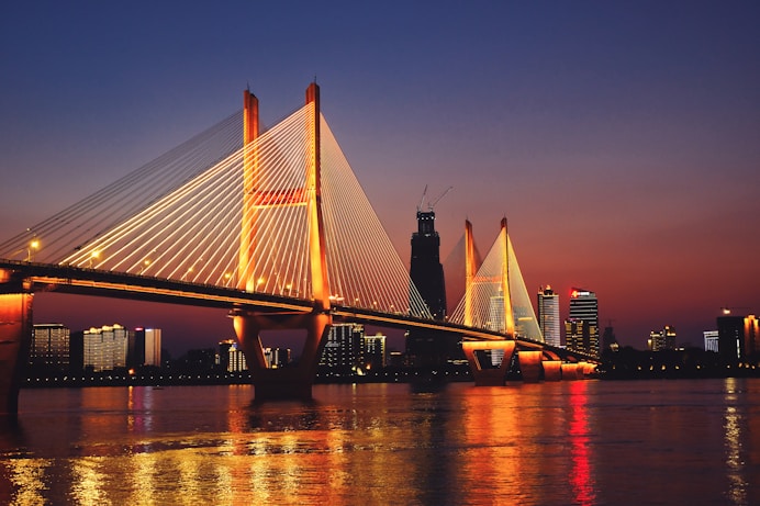 a large bridge spanning over a large body of water