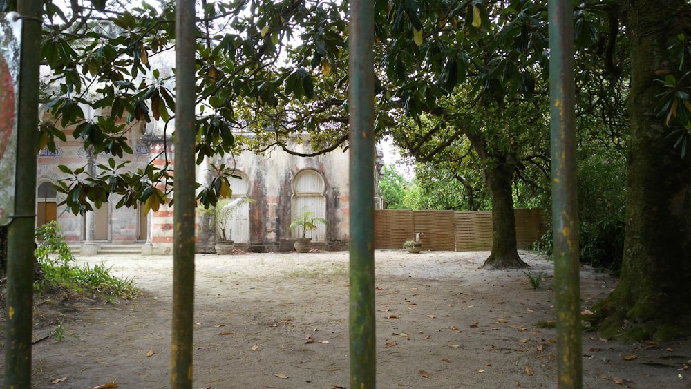 a building with a lot of trees in front of it