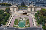 Aerial shot of a vibrant urban park filled with people.