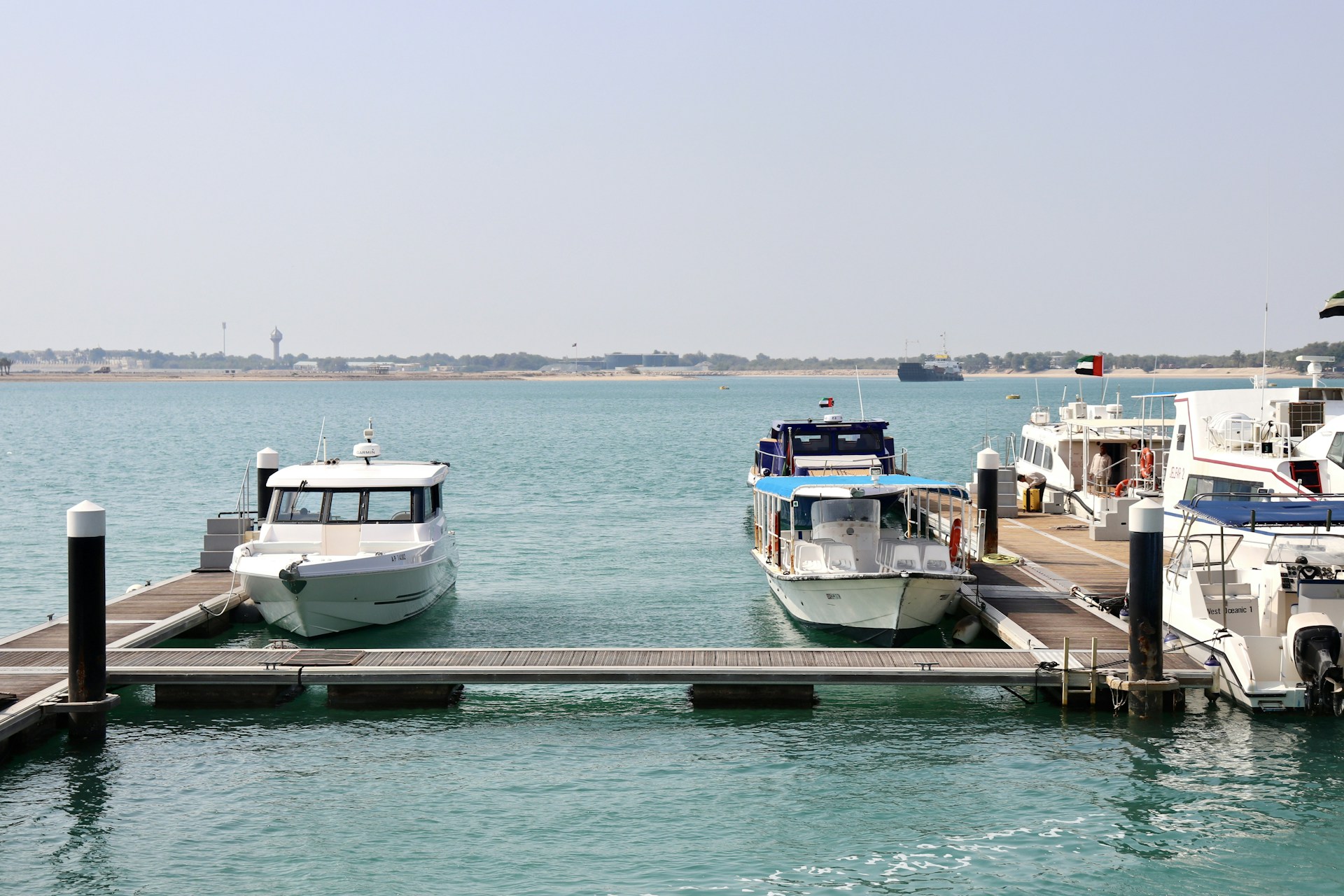 woman wearing yellow long-sleeved dress under white clouds and blue sky during daytime
