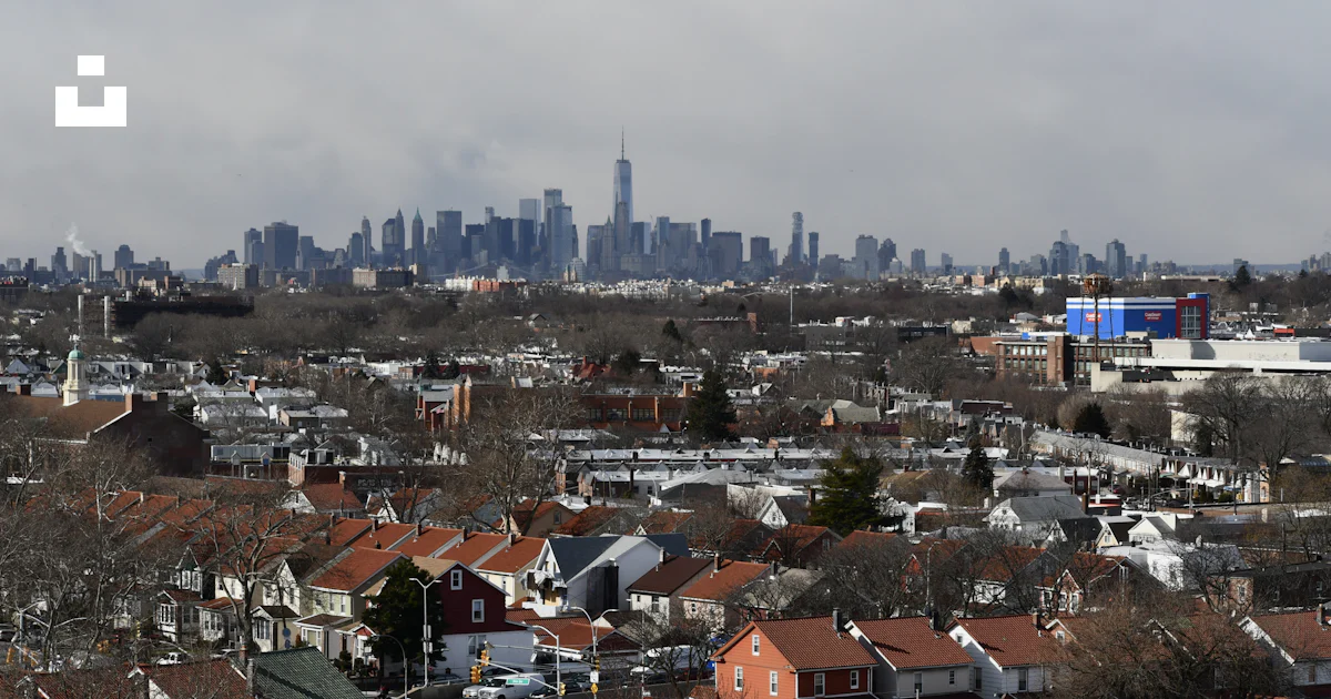 A view of a city from a distance photo – Free Manhattan skyline Image ...