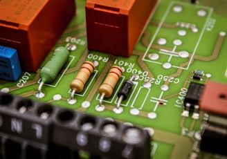 a close up of a circuit board with some electronic components