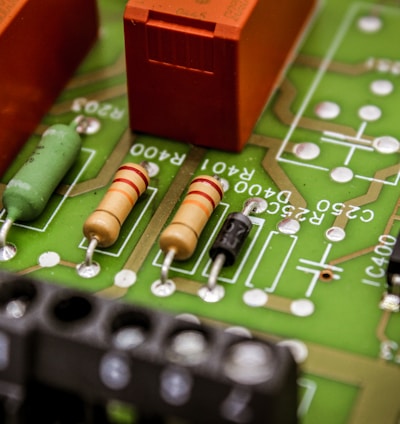 a close up of a circuit board with some electronic components