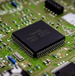 a close up of a computer chip on a printed circuit board