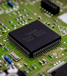 a close up of a computer chip on a printed circuit board