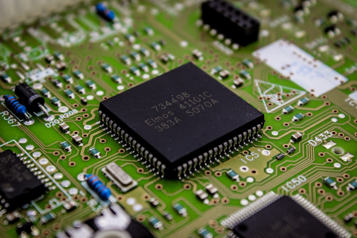 Close-up of a computer chip on a printed circuit board representing semiconductor manufacturing