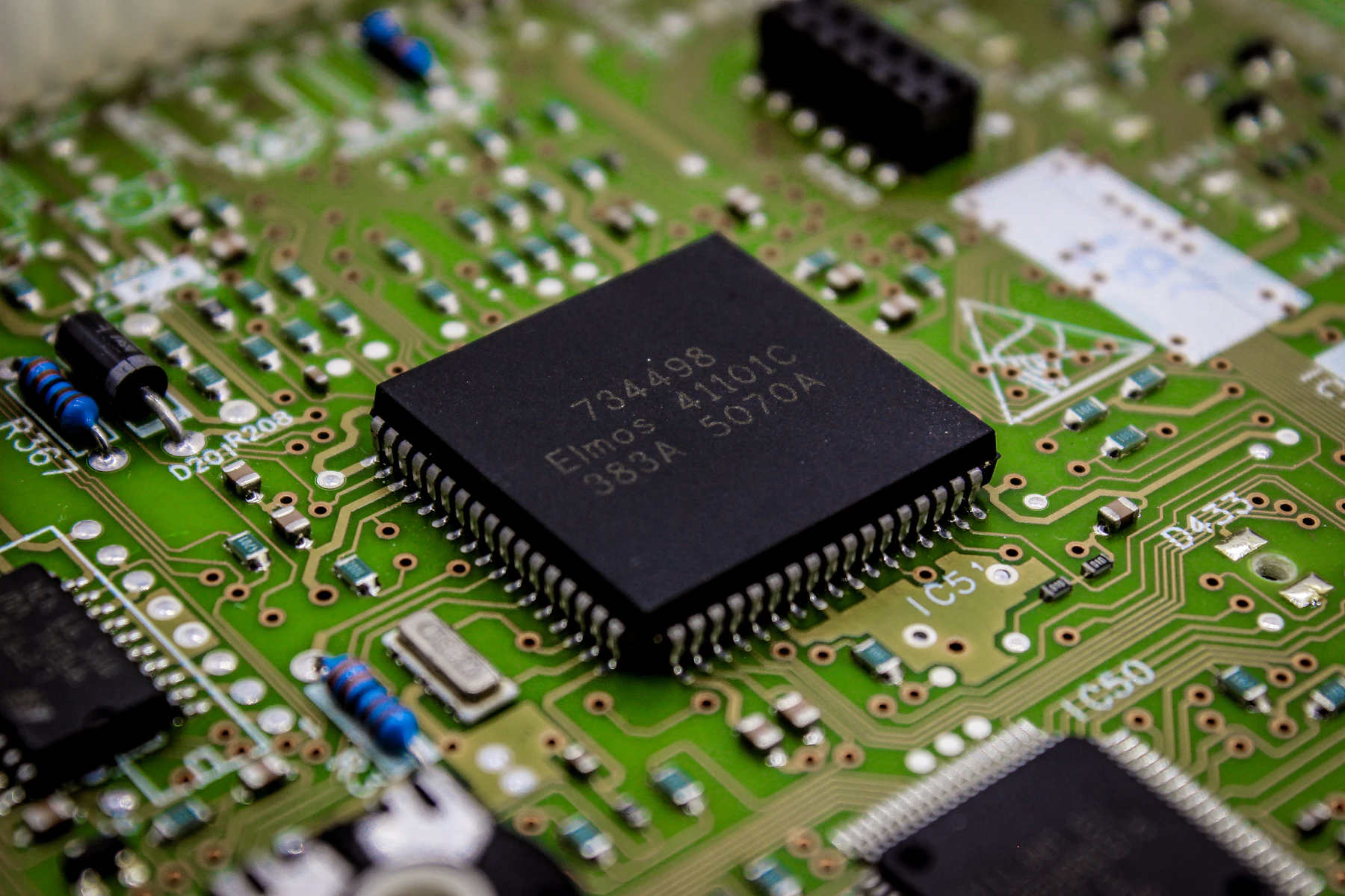 Close-up of a computer chip mounted on a circuit board
