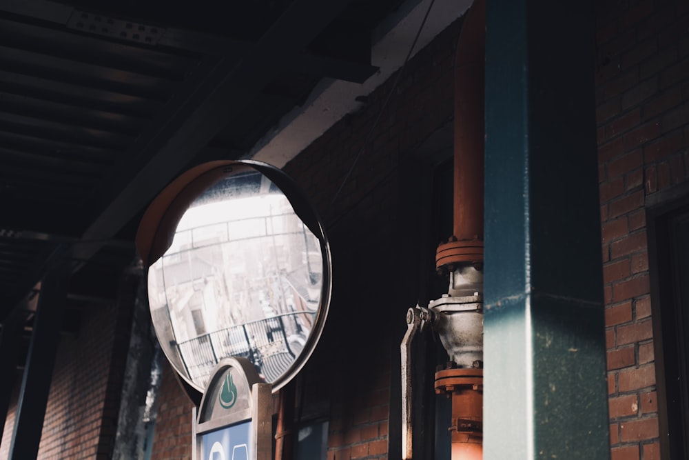 a mirror on the side of a building