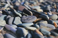 Variety of colorful landscaping stones displayed in natural light.