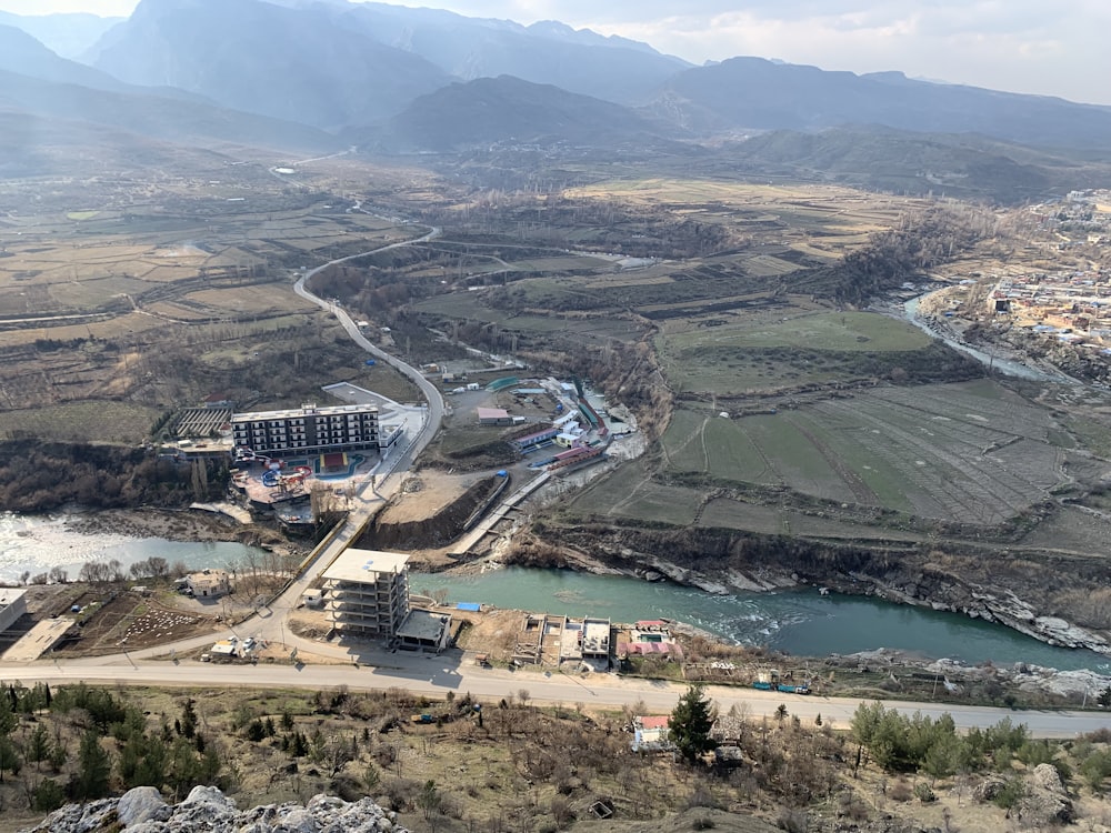 an aerial view of a city and a river