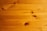 Close-up of wooden planks with natural grain and smooth finish.