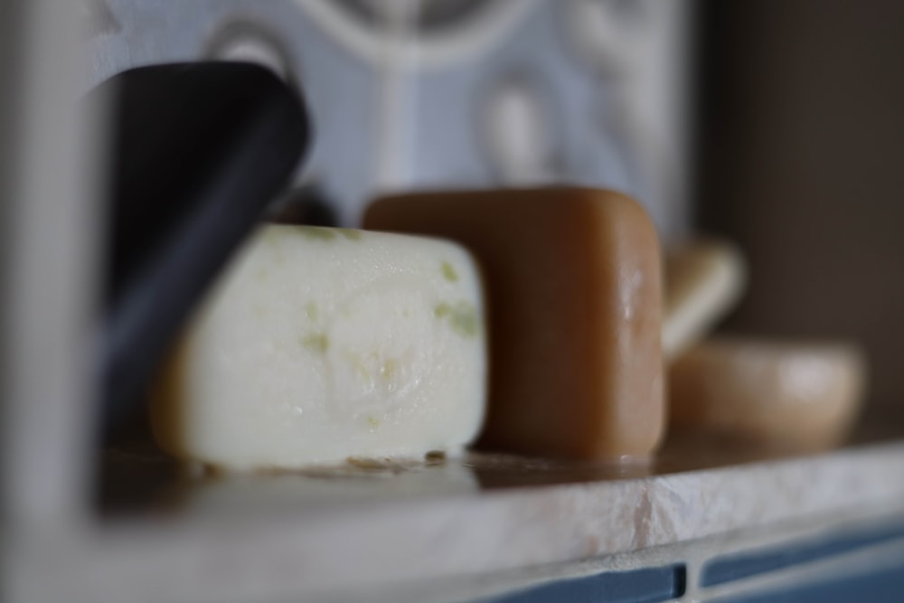 a couple of soaps sitting on top of a counter