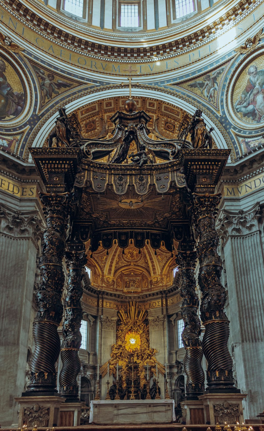 a large cathedral with a statue of a man on the alter