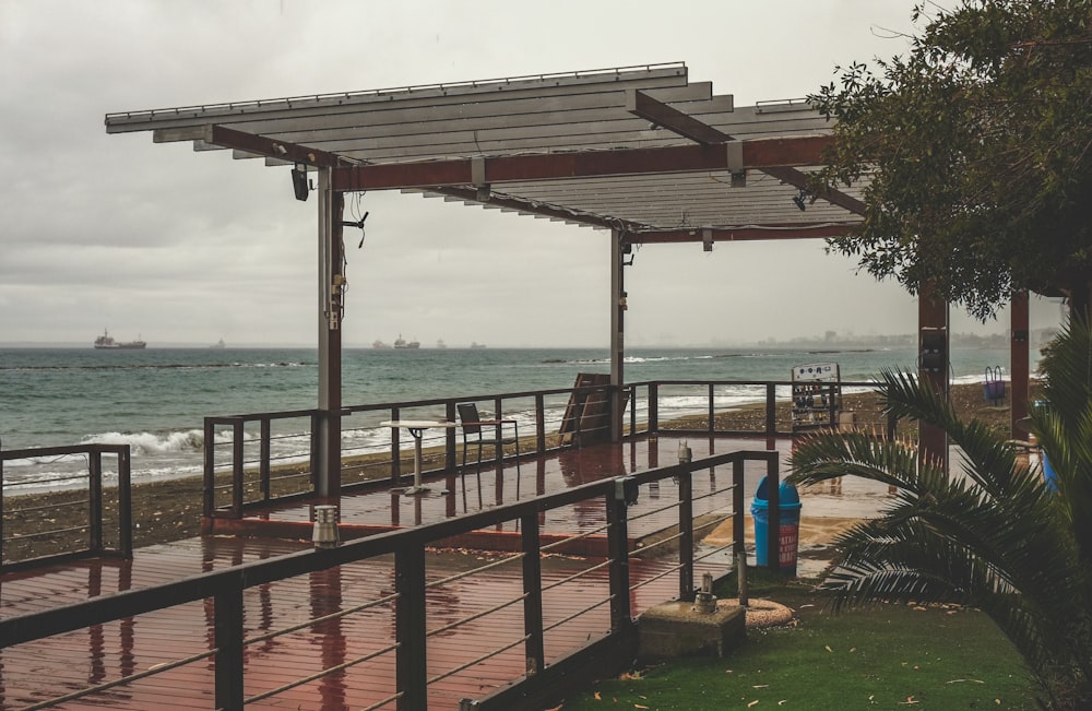 a view of the ocean from a boardwalk