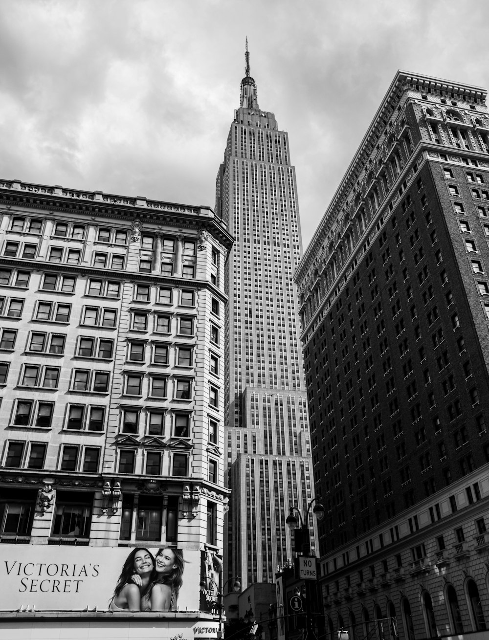 a black and white photo of a very tall building