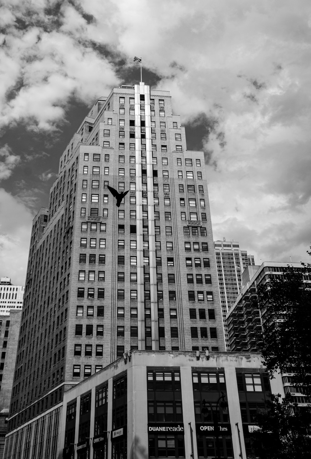 a very tall building with a clock on it's face