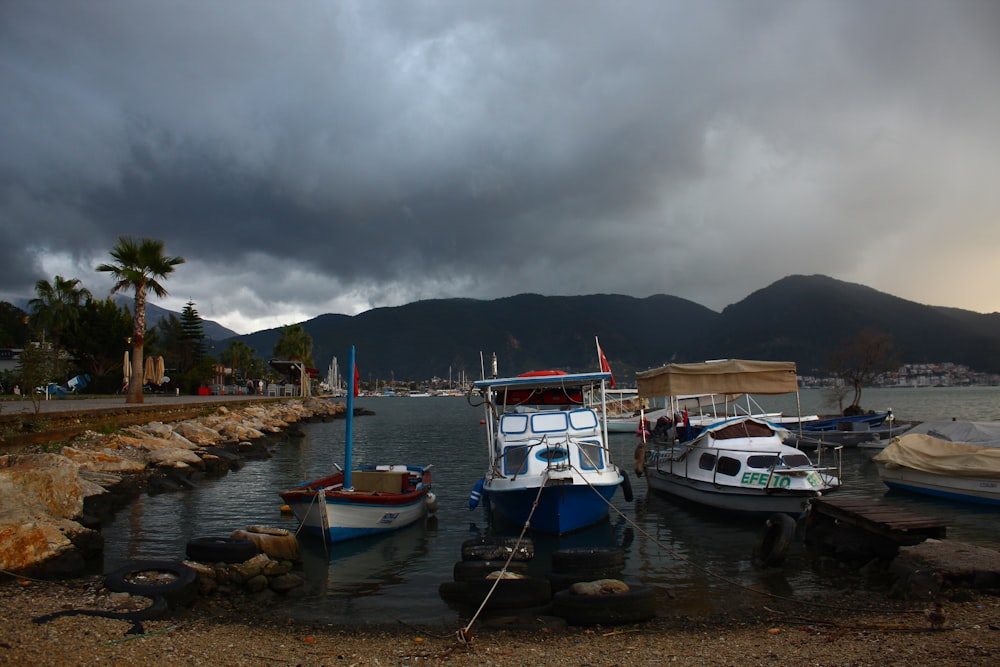 a couple of boats that are sitting in the water