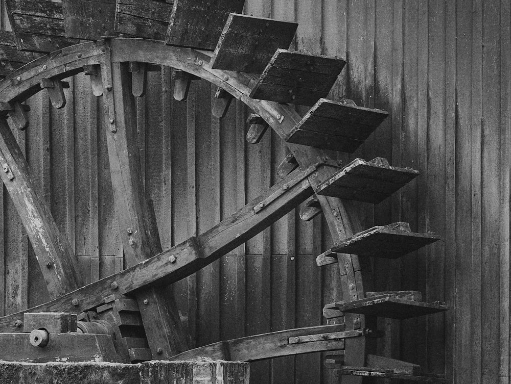 a black and white photo of a wooden structure