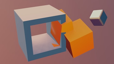 A 3D render features a large, hollow, light gray cuboid with an orange cube partially placed inside it. Another smaller cube, colored in a gradient of purple and white, floats nearby on a plain muted background.