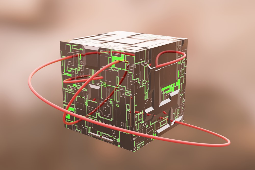 une boîte avec un cordon rouge connecté à celle-ci