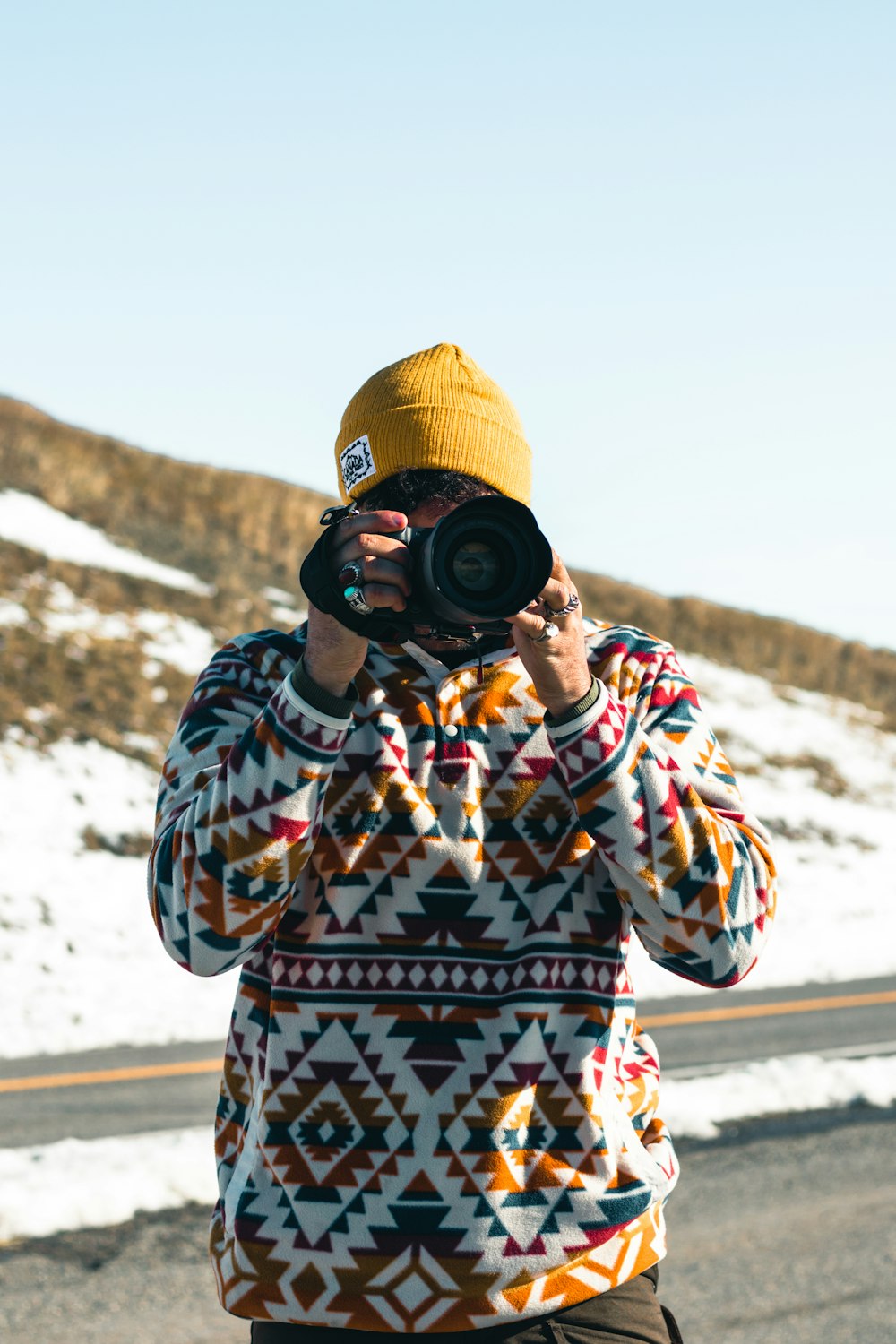 a man taking a picture of himself with a camera