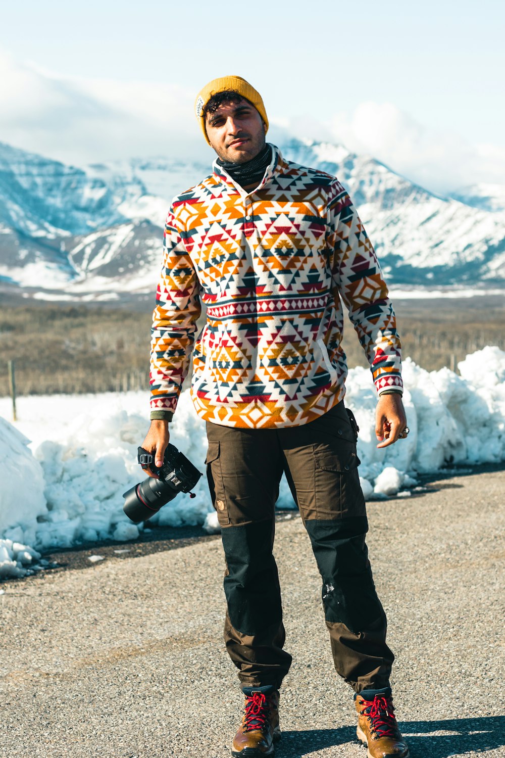 a man standing in the middle of a road