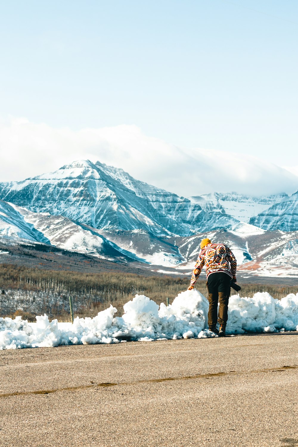 a person walking on the side of a road