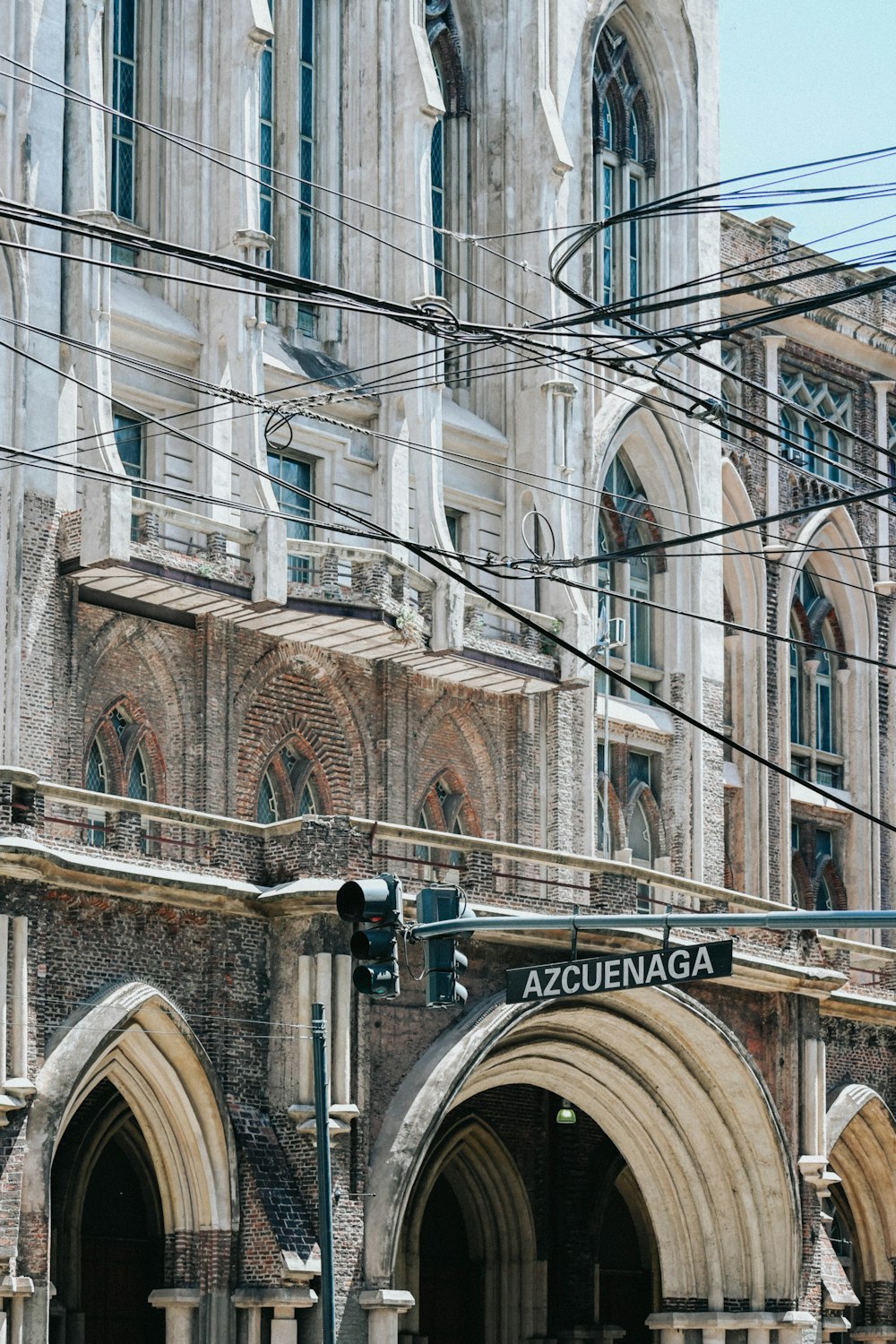 an old building with a clock tower in the background