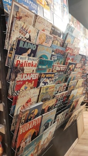 A collection of various metal signs showcasing different styles and finishes.