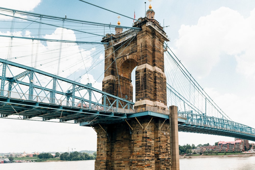 a tall bridge spanning over a body of water