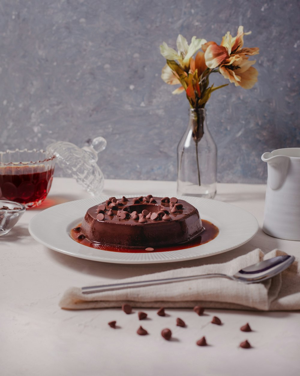 a piece of chocolate cake on a white plate