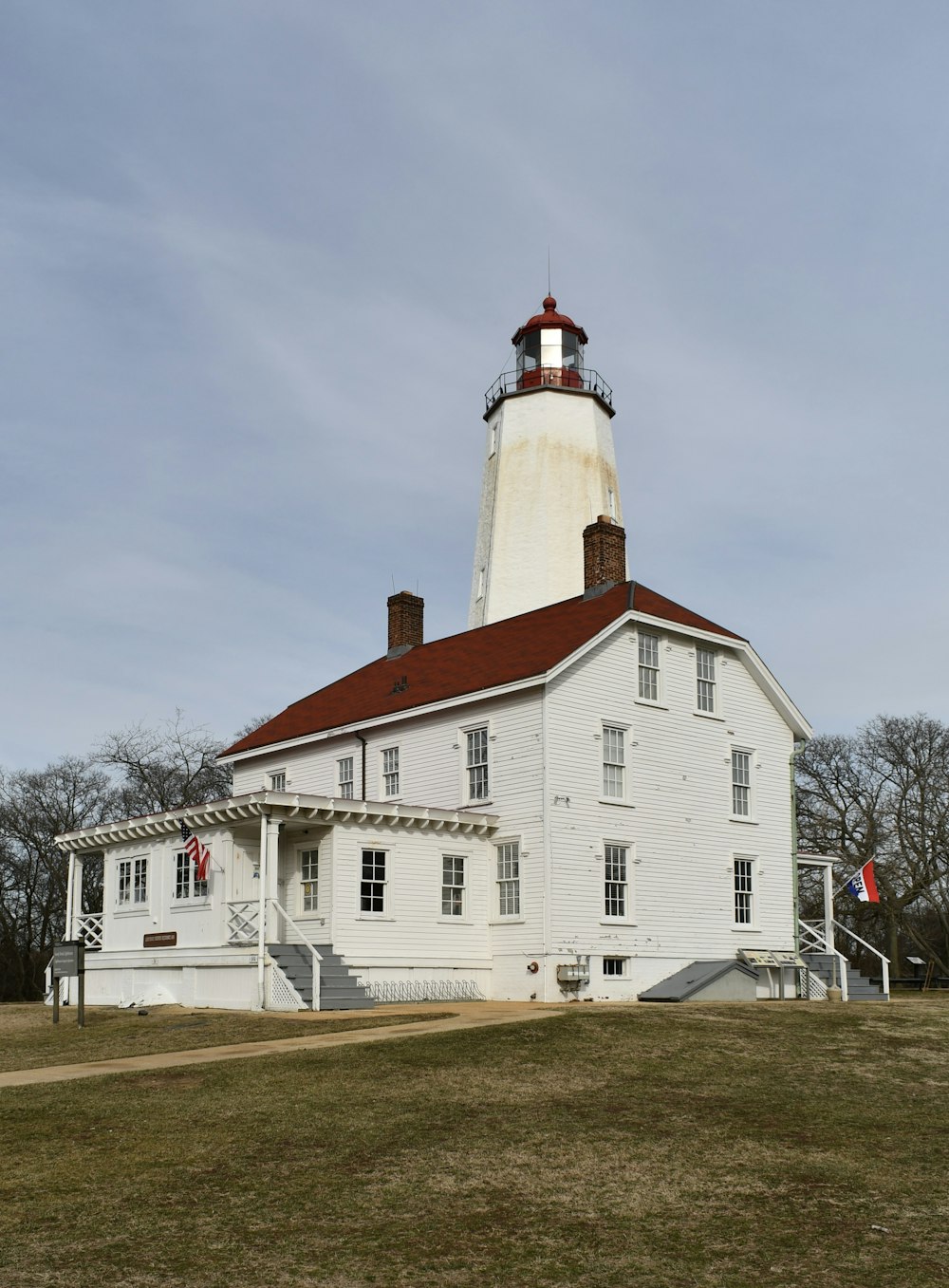 a large white building with a red roof