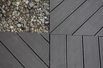 Close-up of colorful interlocking parke taşları arranged in a modern outdoor patio.