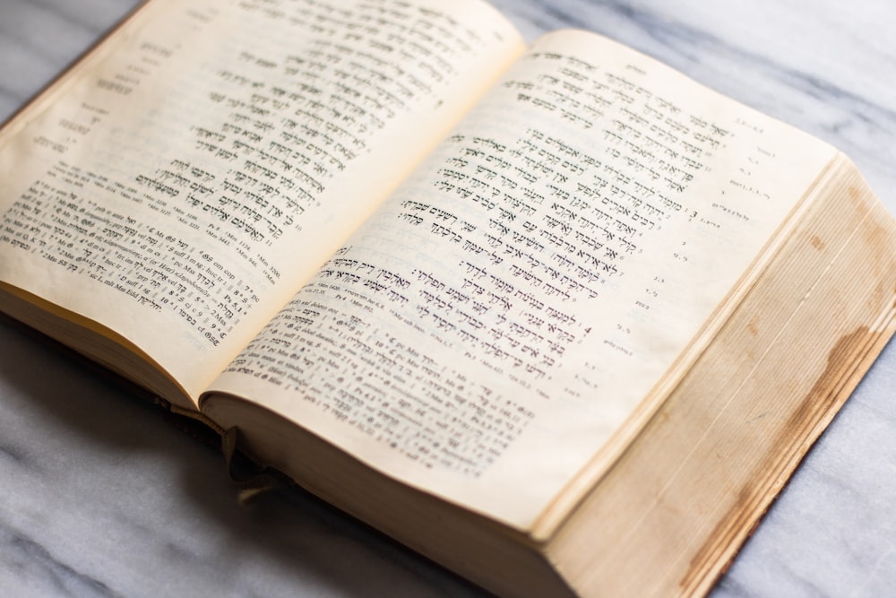 an open book sitting on top of a table