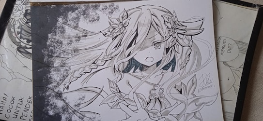 A detailed black and white illustration of an anime character with long flowing hair, braided sections, and floral accessories. The character's eyes are large and expressive, and the mouth is slightly open. The clothing is adorned with detailed patterned designs. The background is partially shaded with splashed ink textures, giving a dynamic feel.