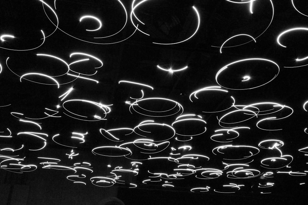 a black and white photo of a bunch of bubbles