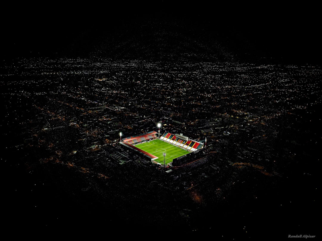 an aerial view of a soccer field at night