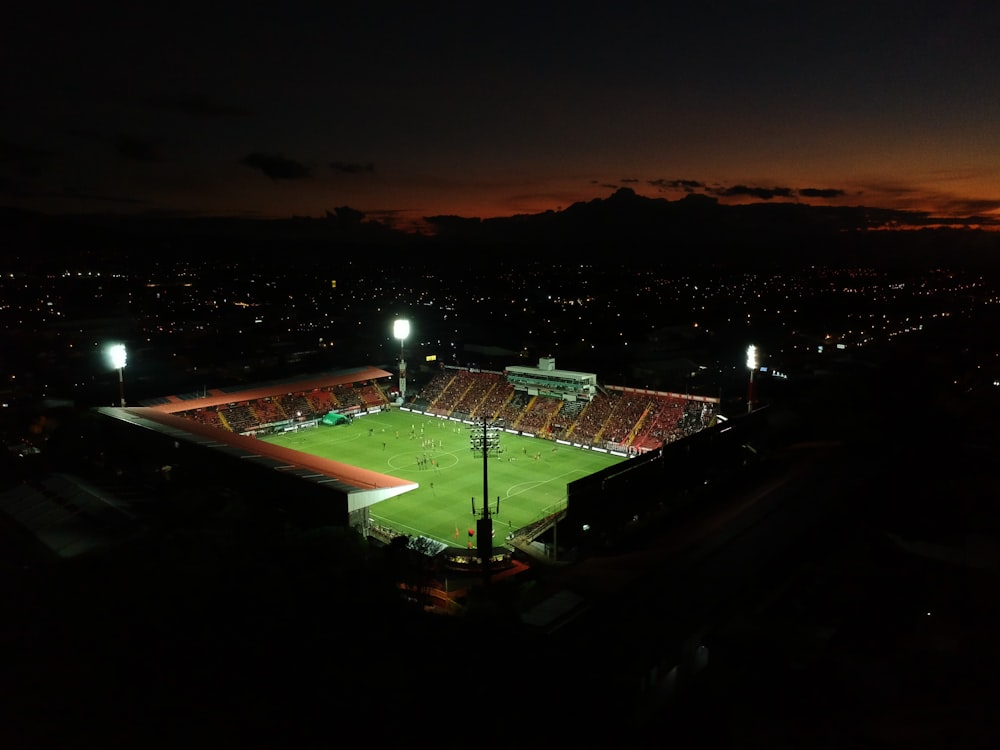 a night time view of a soccer field