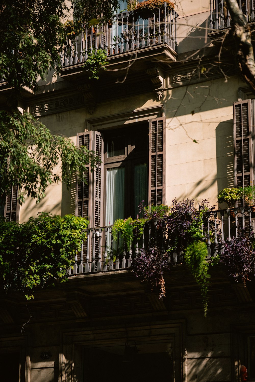 an apartment building with a balcony and balconies