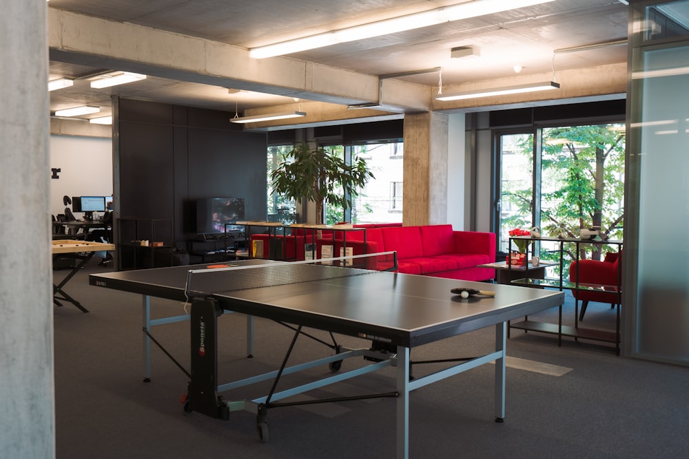 a ping pong table in an office setting