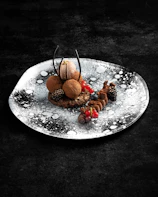 An artfully arranged dessert featuring rich chocolate and berries.