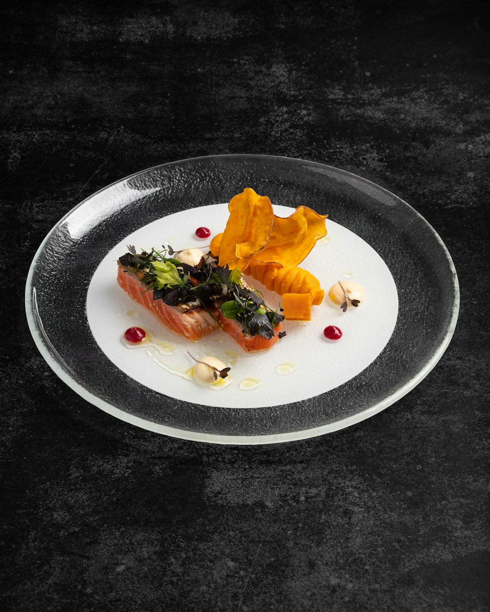 a white plate topped with food on top of a table