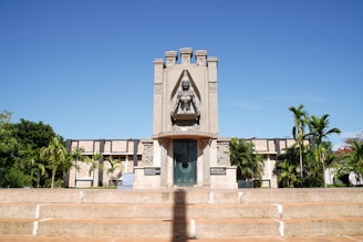a tall building with a clock on the front of it
