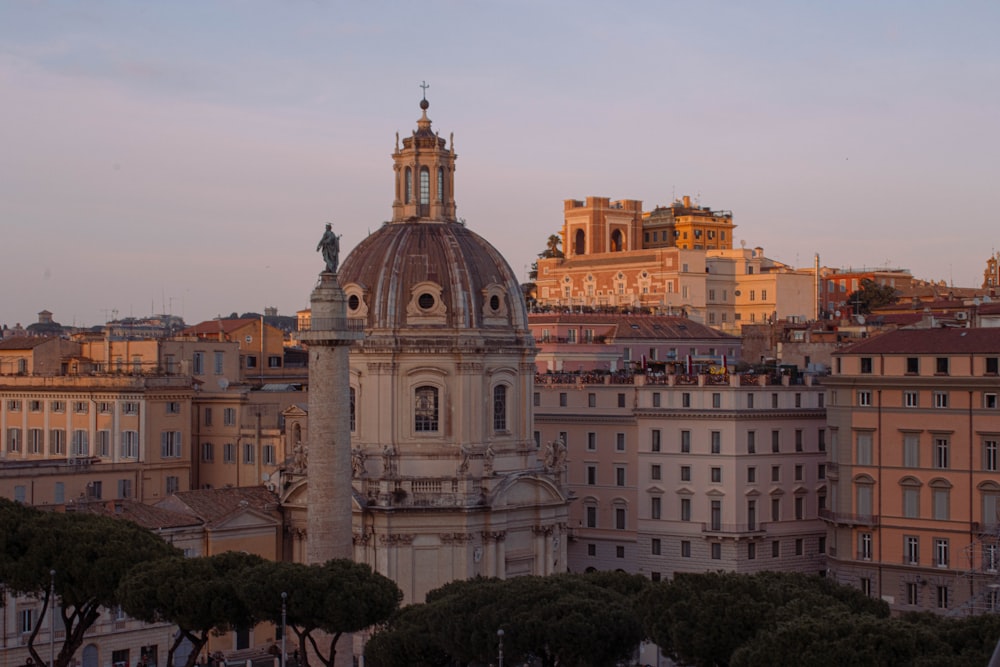 a view of a city with buildings and a clock tower