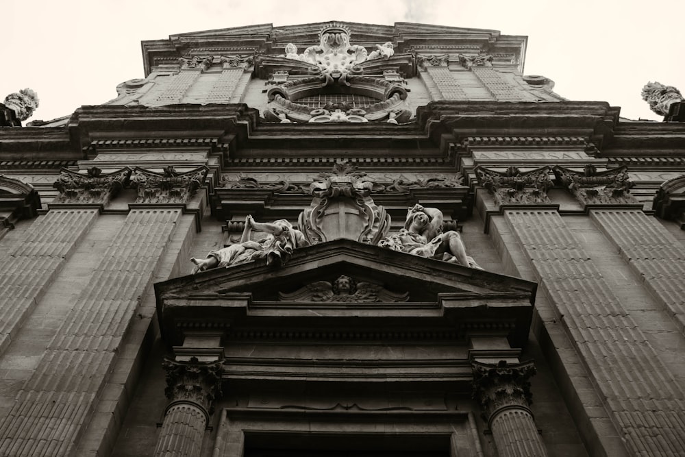 a black and white photo of a tall building