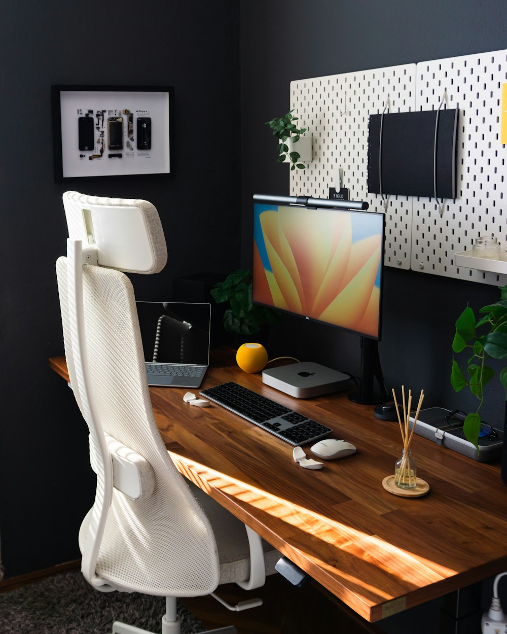 a desk with a computer and a keyboard