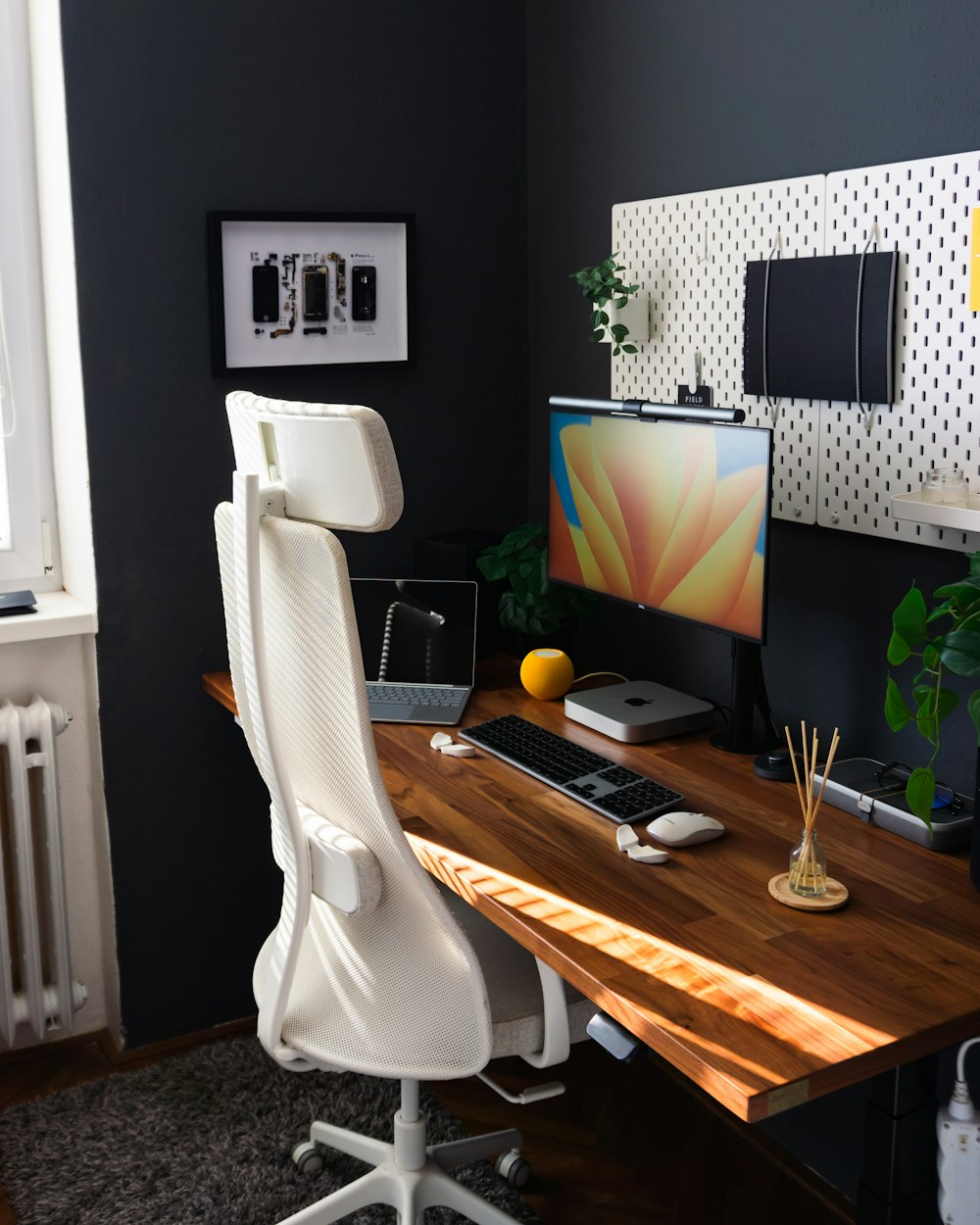 a desk with a computer on top of it