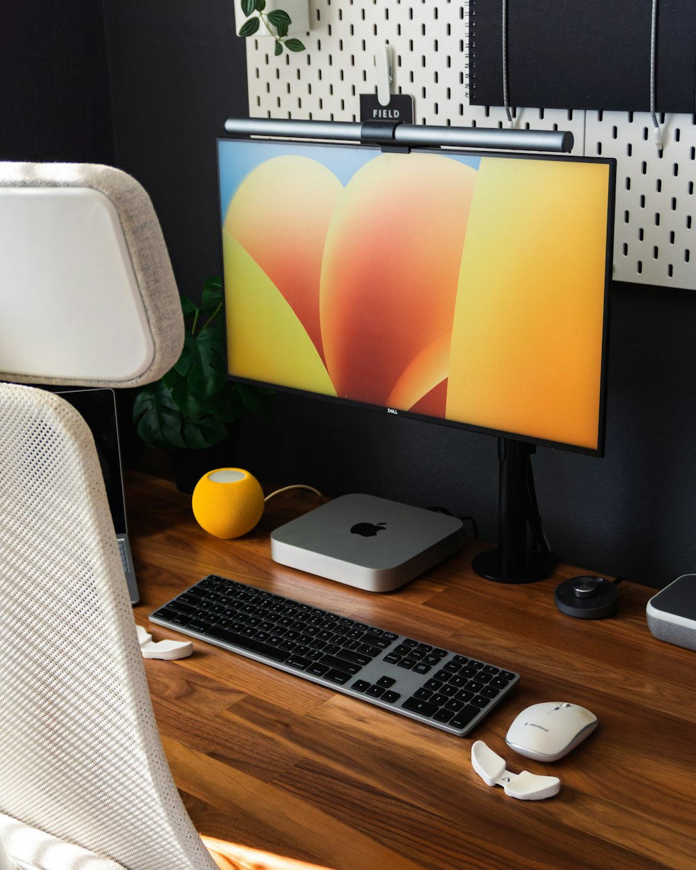 a desktop computer sitting on top of a wooden desk