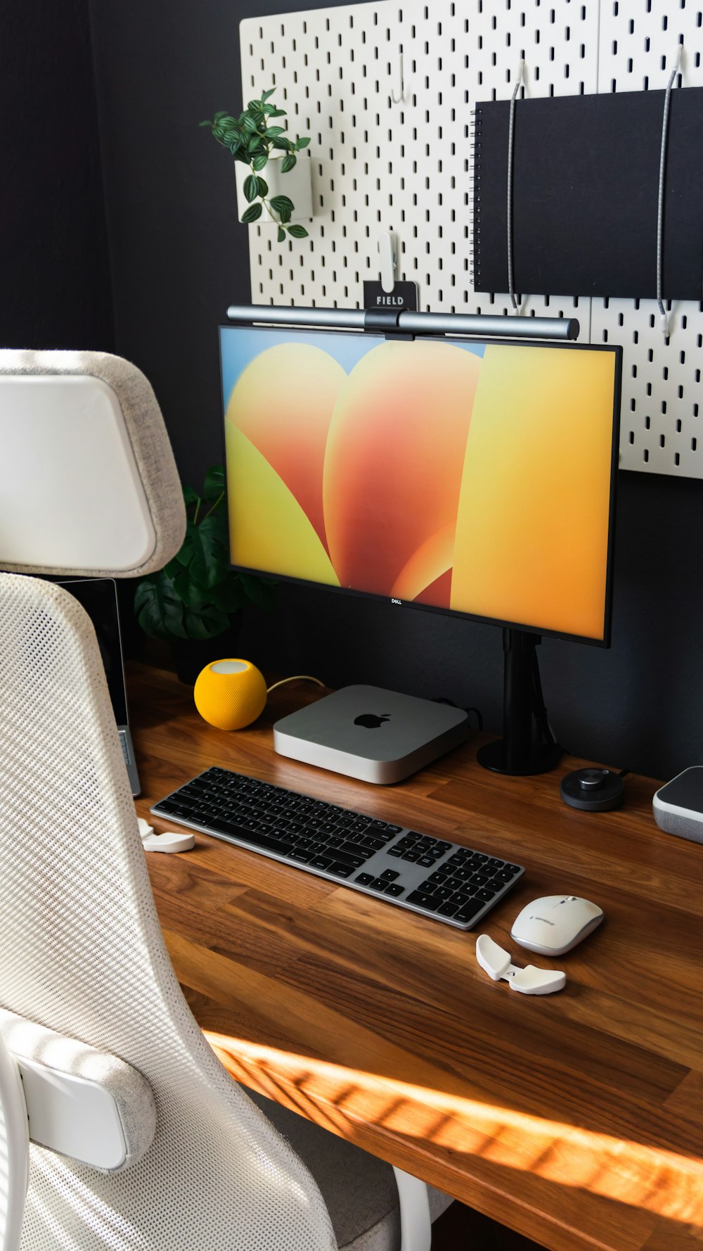 a desktop computer sitting on top of a wooden desk